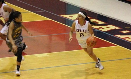 Hunter Muranaka playing in one of her high school basketball games.